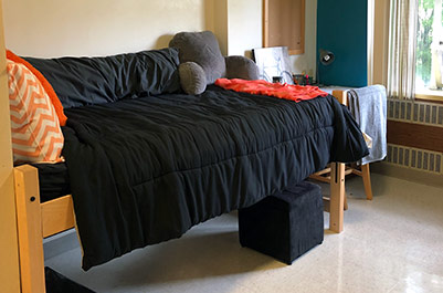 Bed in Bloss Hall room