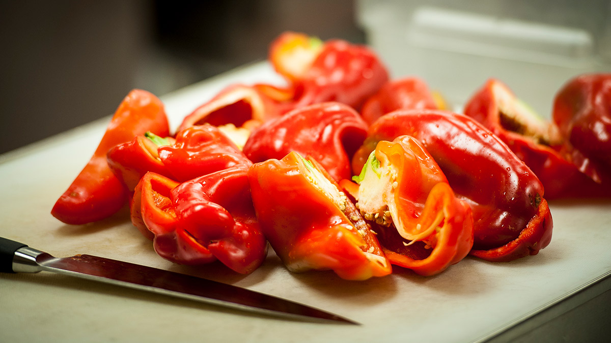 Chopped bell peppers on cutting board