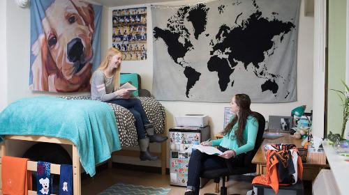 two students in west hall residence hall room